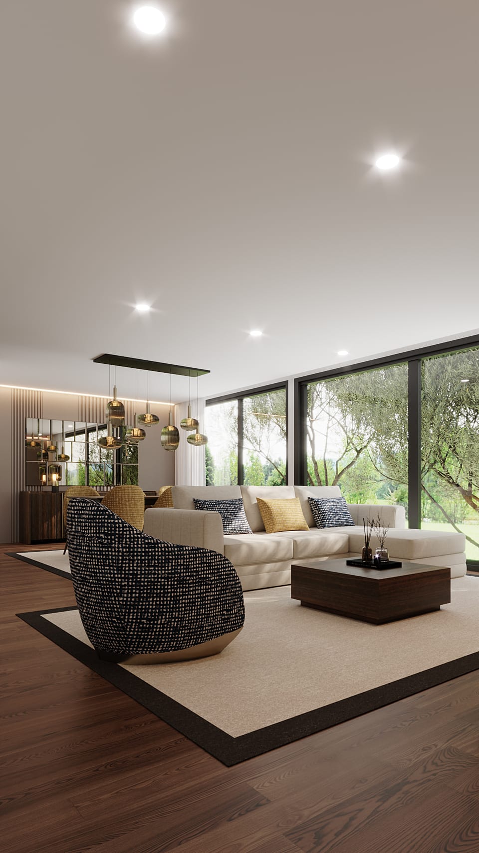 Large living room with pale modular sofa, patterned round armchair and floor-to-ceiling garden windows