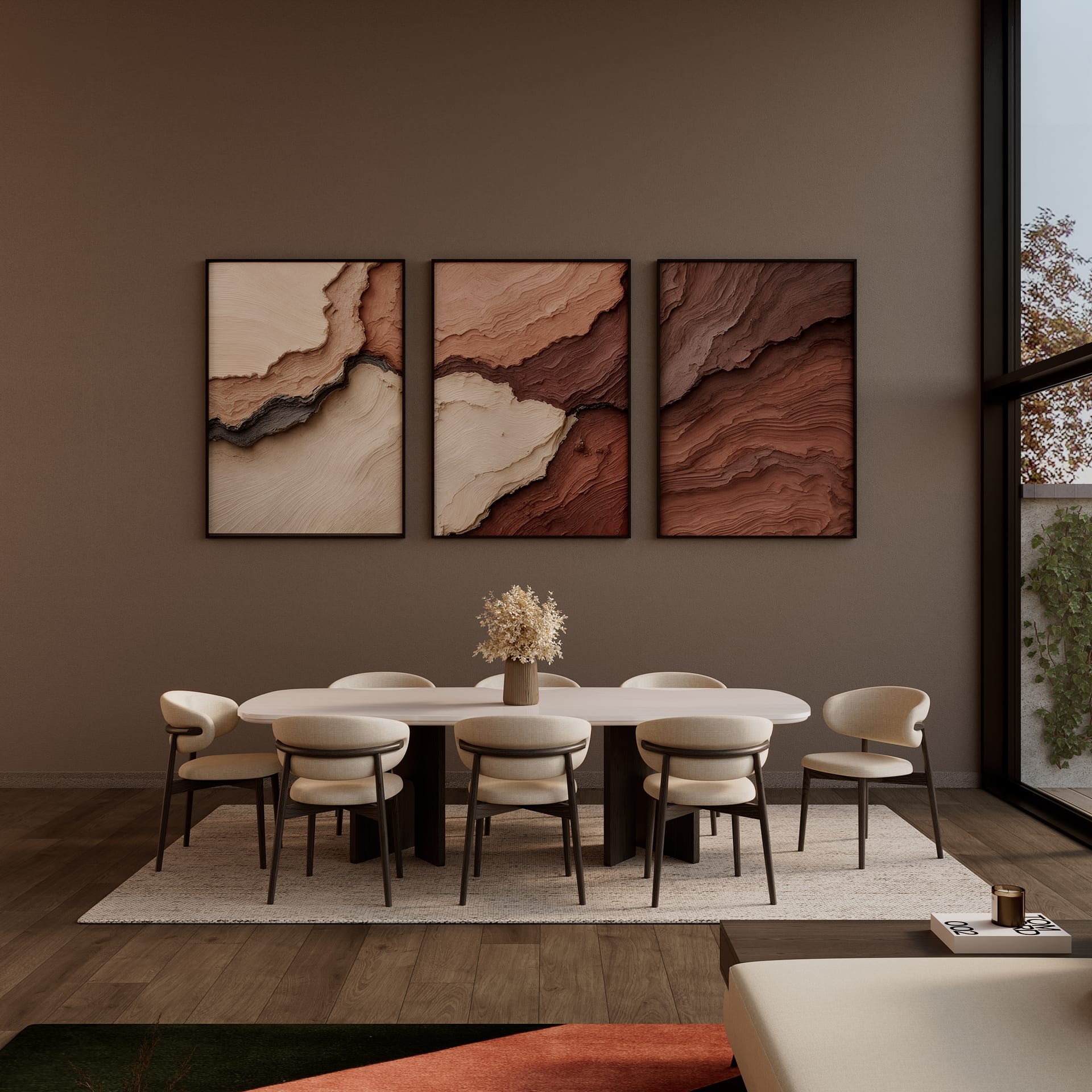 Dining area with pale oval table on a dark plinth, eight cream chairs and an earth-toned abstract triptych
