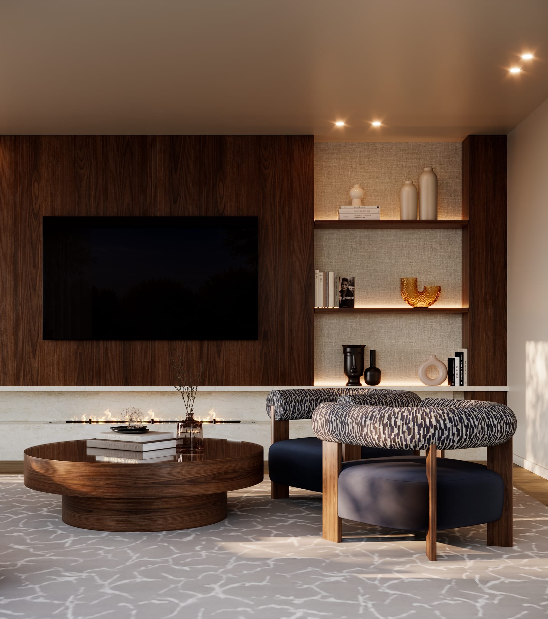 Dark wood panelling with a television and a linear stone fireplace, round coffee table and two armchairs