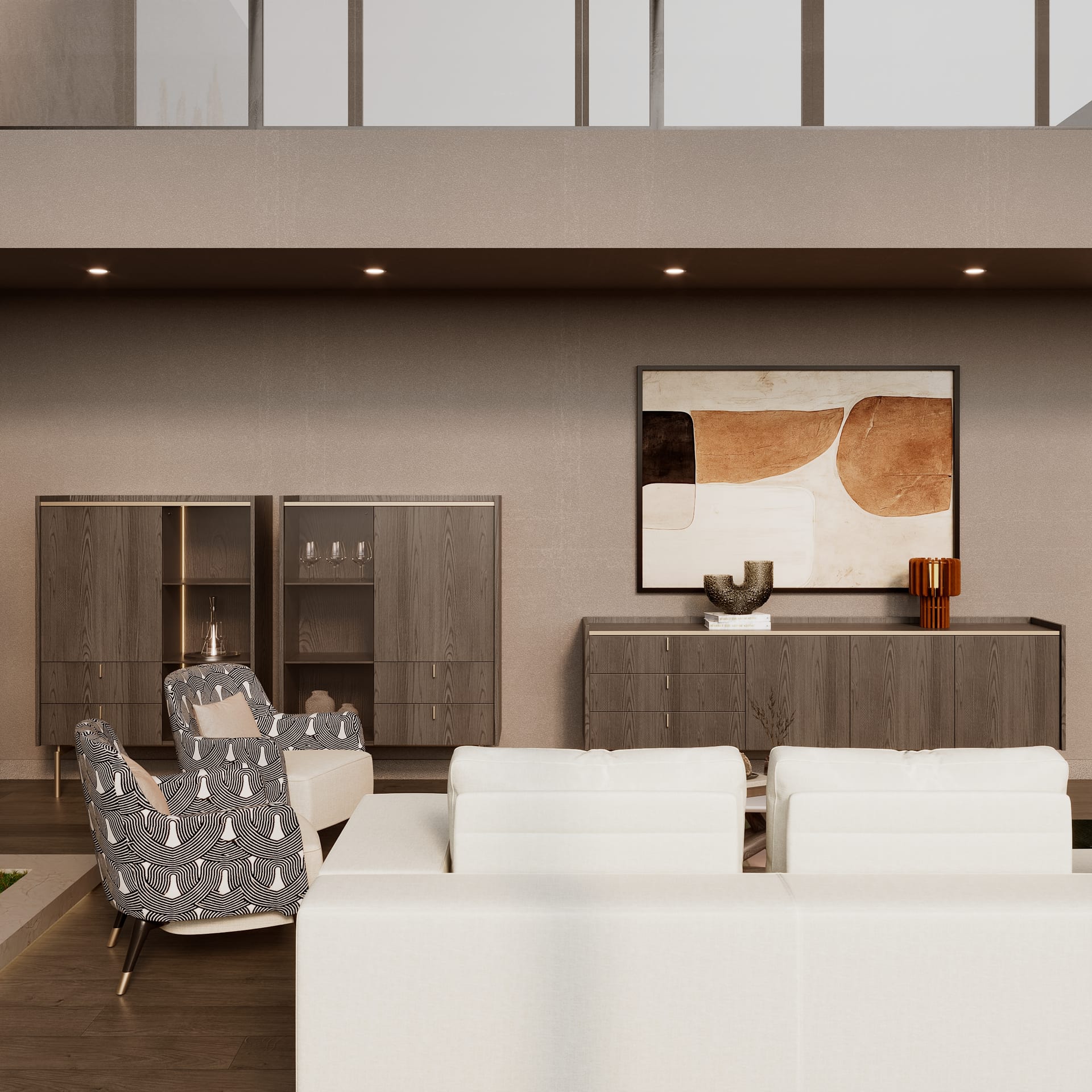 Long sideboard and display cabinets in dark wood below a rust-toned abstract canvas, white sofas in the foreground