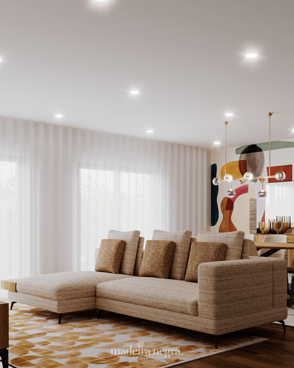 Living room with a beige corner sofa and yellow rug, and a dining area with a colourful mural beyond